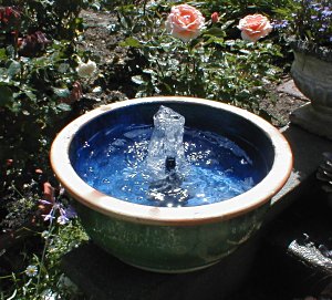 Create unique sounds and appearance by arranging river rocks in your fountain